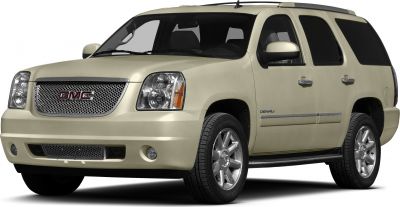 Front grille and side profile of beige SUV with alloy wheels