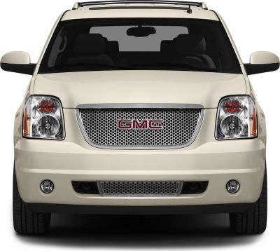 Mesh front grill with dual round headlights and fog lights.