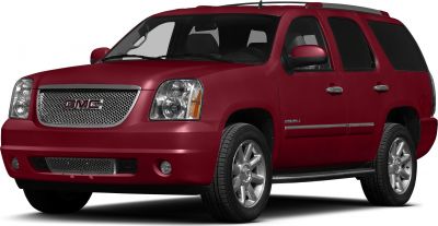 Red SUV front-side view with mesh grille and alloy wheels