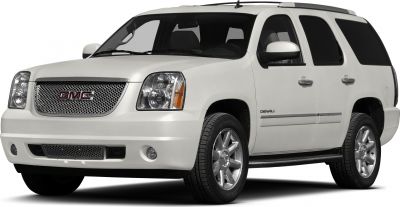 Front side view of white SUV with grille and headlights