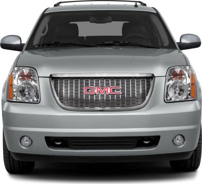 Chrome grille and dual headlights in a front SUV view
