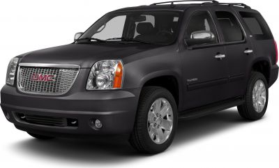 Front side view of SUV with chrome grille and large wheel arches