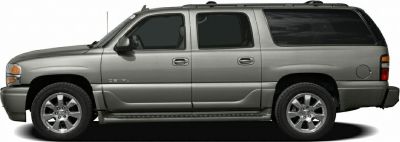 Silver full-size SUV side profile with chrome wheels and extended body