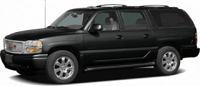 Front side view of a large extended SUV with alloy wheels