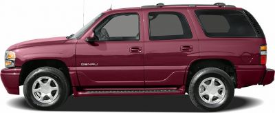 Side profile of SUV with Denali badge and tinted windows