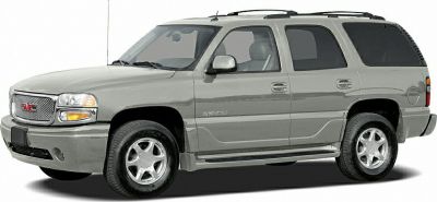 2000 SUV side view with chrome grille, roof rails, five-spoke wheels