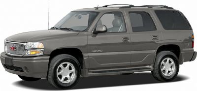 Wide front grille and full-size SUV silhouette with alloy wheels and roof rails