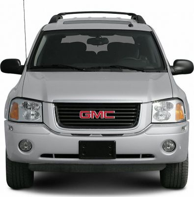 Silver SUV front with grille, headlights, and fog lamps