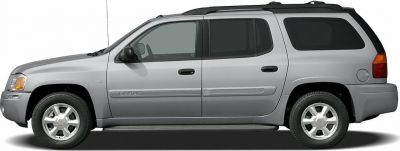 2003 SUV side profile with V6 badge and roof rack