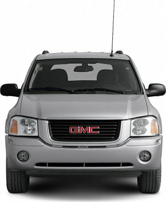 Front view showing grille, headlights, fog lights, and antenna of a large SUV