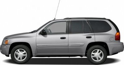 Silver SUV side view with tinted windows and roof rails.