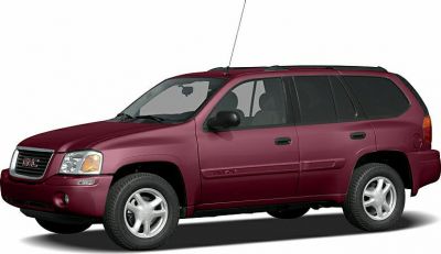 Front-side view of mid-size SUV with roof rack and five-spoke wheels