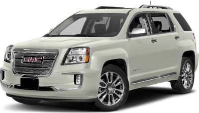 Front side view of SUV with chrome grille and alloy wheels