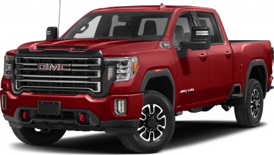 Front and side view of heavy-duty pickup with distinctive grille and double cab