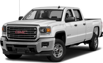 Front and side view of heavy duty pickup with regular cab and long bed.