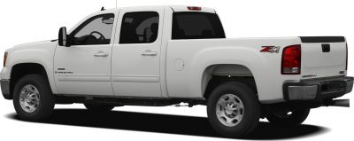 Side view of extended cab pickup with standard bed and dual rear doors