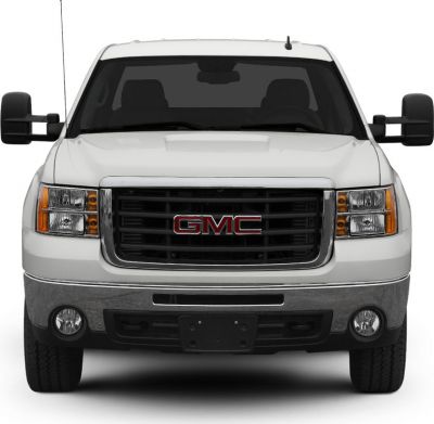 Front view of extended cab pickup with distinctive grille and headlights
