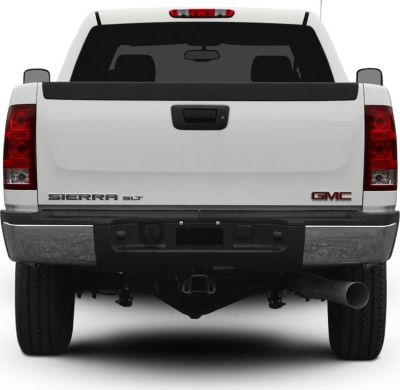 Rear view with tailgate, bumper, and exhaust pipe of a pickup truck