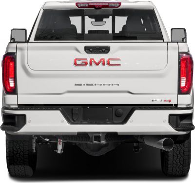 Rear view of pickup with tailgate, taillights, and towing hitch