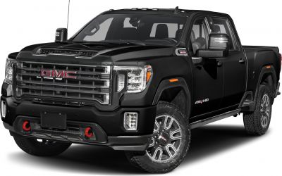 Front-side view of pickup with grille, headlights, tow hooks, rugged wheels