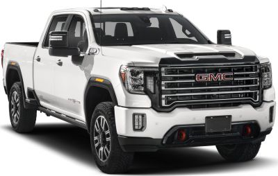 Heavy-duty pickup truck with bold grille and regular cab long bed.