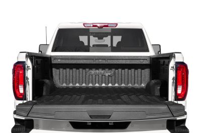 Open tailgate with textured protective bed liner