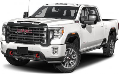 Front view of rugged pickup with distinct grille and heavy-duty wheels