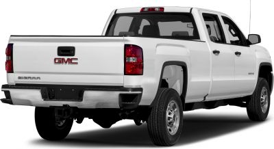 Rear and side view of white heavy-duty pickup truck with regular cab and long box