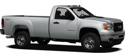 Side profile of a pickup with crew cab and standard box.