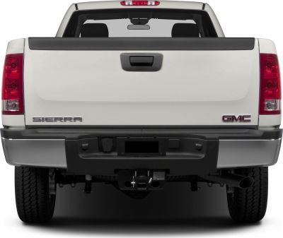 Rear view of pickup tailgate with brake lights and trailer hitch