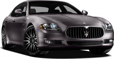 Front of luxury sports sedan with LED daytime lights and vertical slat grille