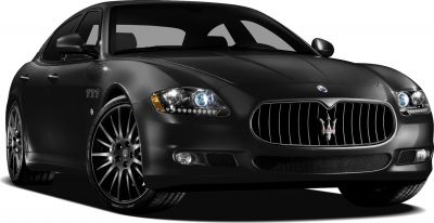 Close-up of front grille, headlights, and alloy wheels.