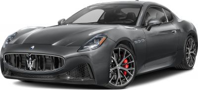 Sleek front grille with large emblem, LED headlights, multi-spoke alloy wheels with red brake calipers
