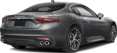 Rear view with quad exhaust tips and sporty alloy wheels