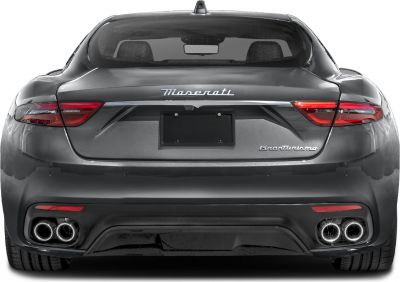 Rear view with sleek tail lights and quad exhaust tips