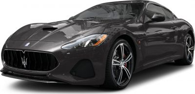Front grille, headlights, and alloy wheels of a luxury sports coupe