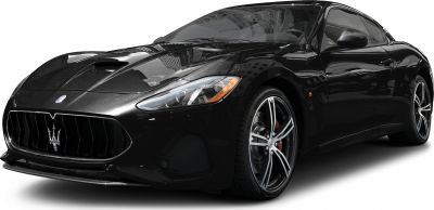 Front grille with trident emblem and stylish alloy wheels on a sleek black coupe