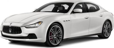 White luxury four-door sedan with prominent grille and alloy wheels
