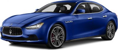 Blue sedan with aggressive front grille and sporty alloy wheels