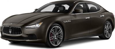 Luxury sedan front-side view with a distinctive grille and alloy wheels