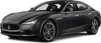 Front-side profile of luxury sedan with aggressive grille and alloy wheels