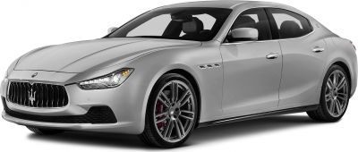 Front side view of luxury sedan with iconic grille and sporty wheels
