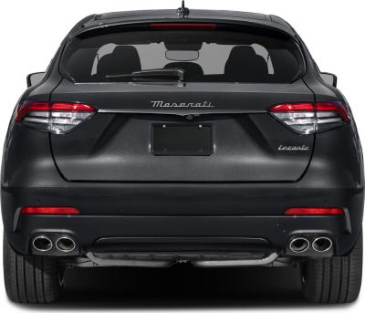 Rear view with quad exhausts and distinctive tail lights.