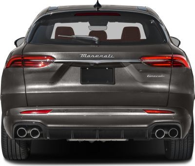 Rear view with dual tail lights and quad exhaust pipes