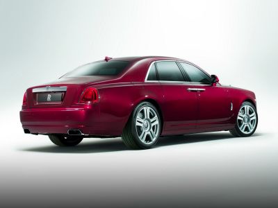 Luxury extended wheelbase sedan rear and side view with distinctive taillights and premium wheels
