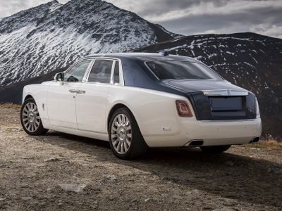 Extended wheelbase luxury sedan with two-tone paint and elegant rear design