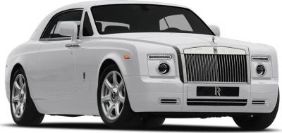 Front view of luxury coupe with iconic grille and round headlights