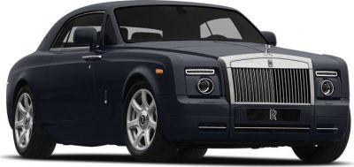 Front view of luxury coupe with iconic grille and sleek headlights