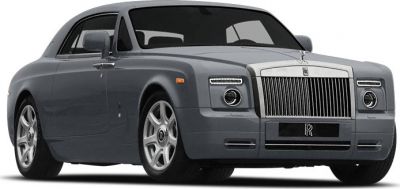 Front view of a luxury coupe with distinctive grille and LED headlights