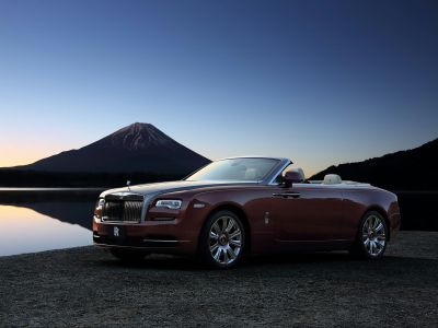 Luxury convertible roadster with chrome grille and elegant design